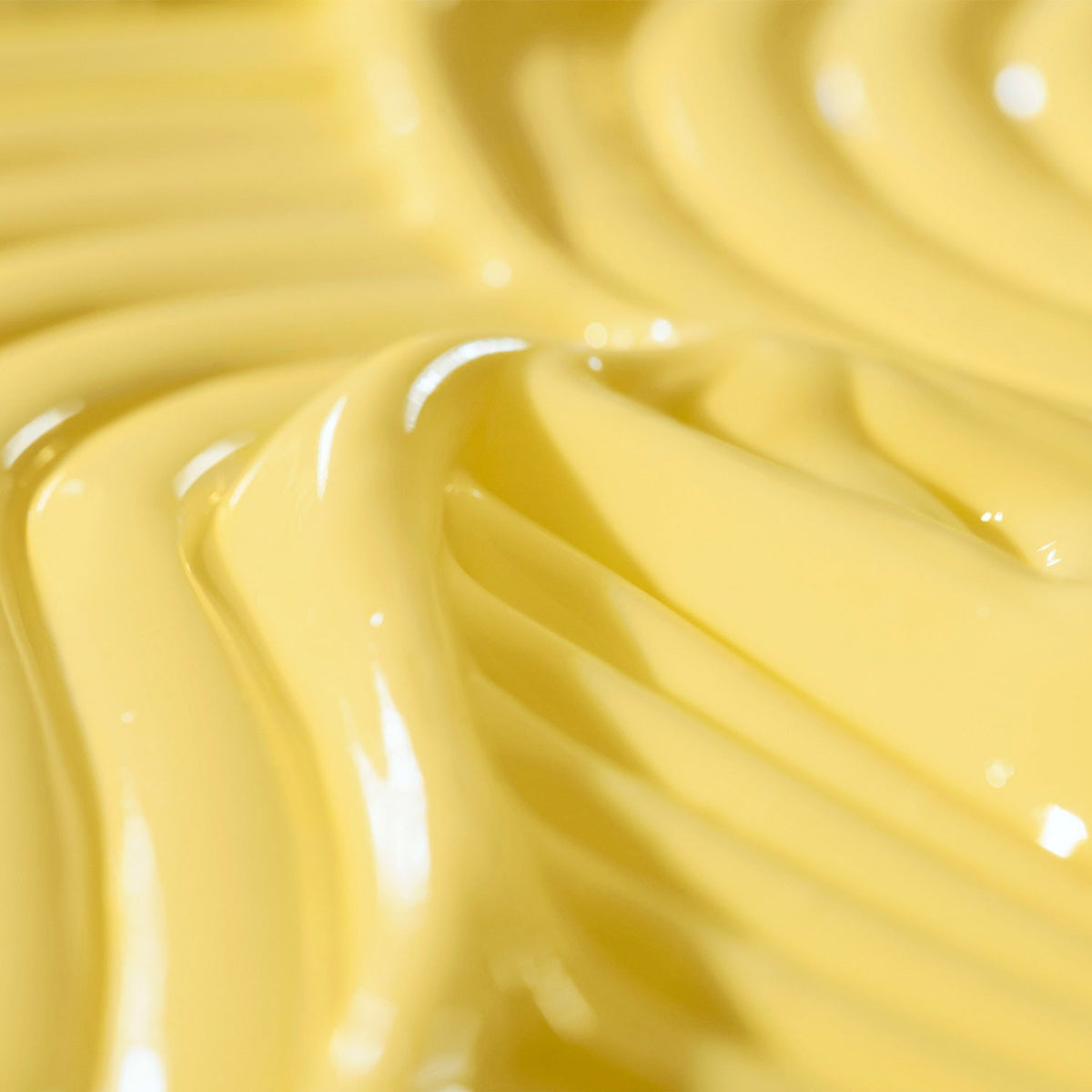 Texturized yellow image of Dewtopia 5% Acid Firming Night Crème. 